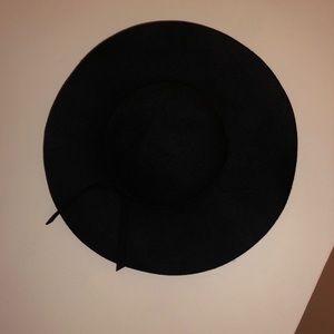 Black belted wide brim hat